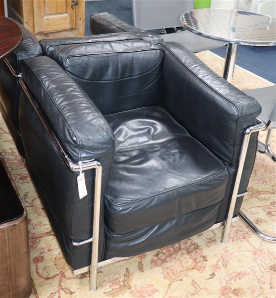 A pair of Corbusier design Lc2 style chairs